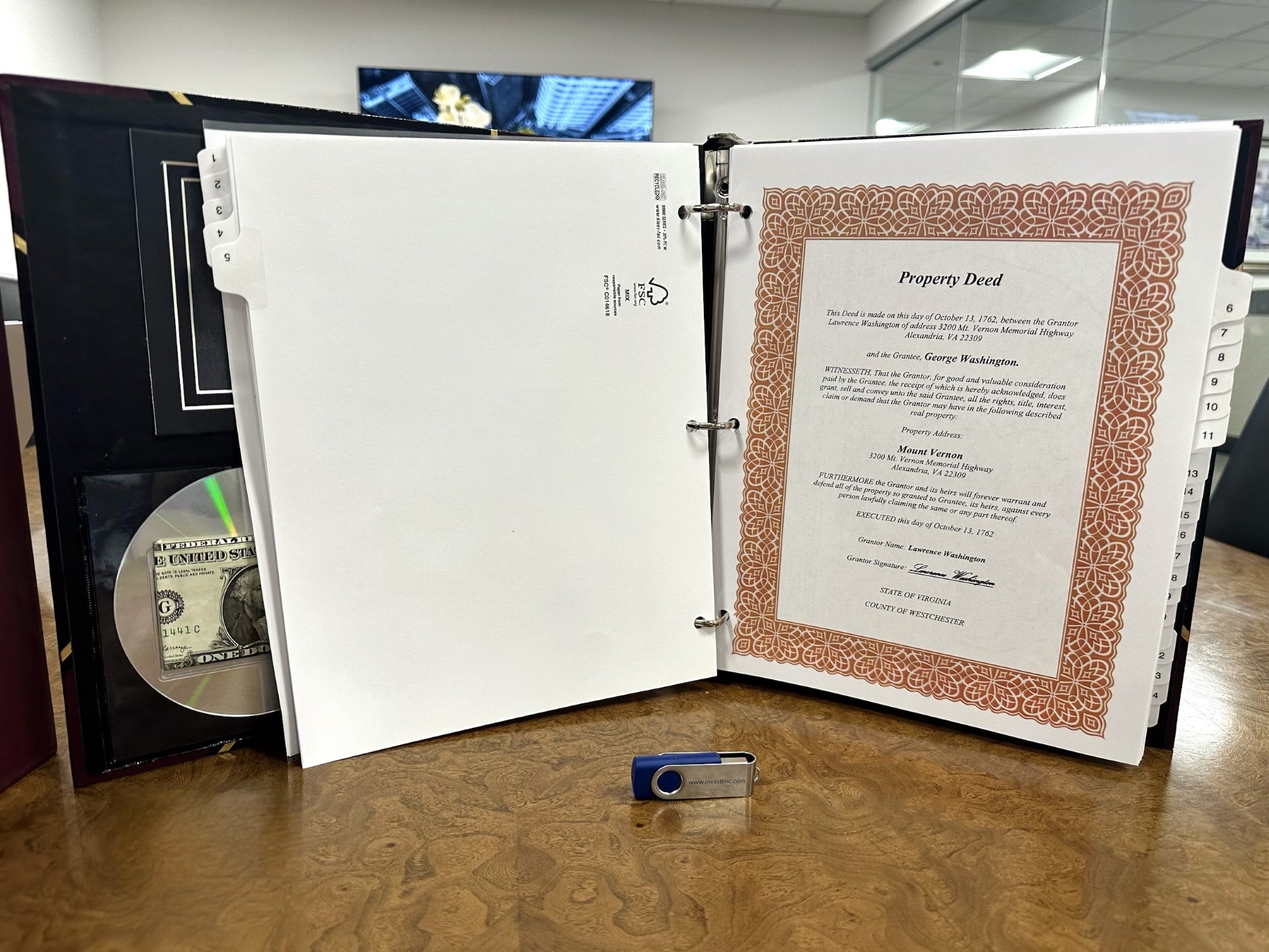 A Compendium binder open to a sample property deed section