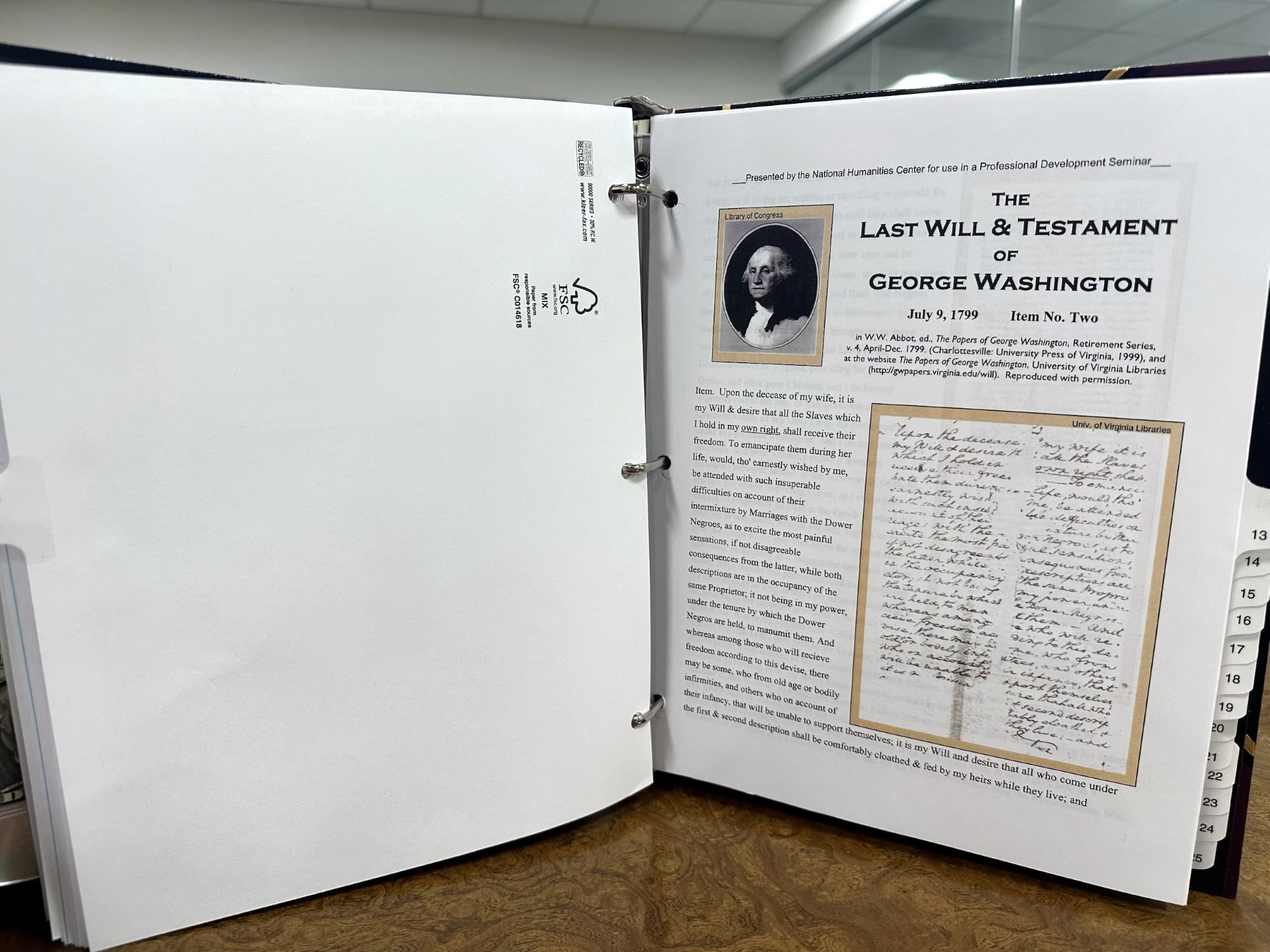 A Compendium binder open to sample estate document pages